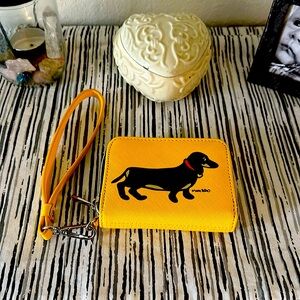 Marc Tetro compact yellow wallet, hand string and sliver hardware. 2 card slots